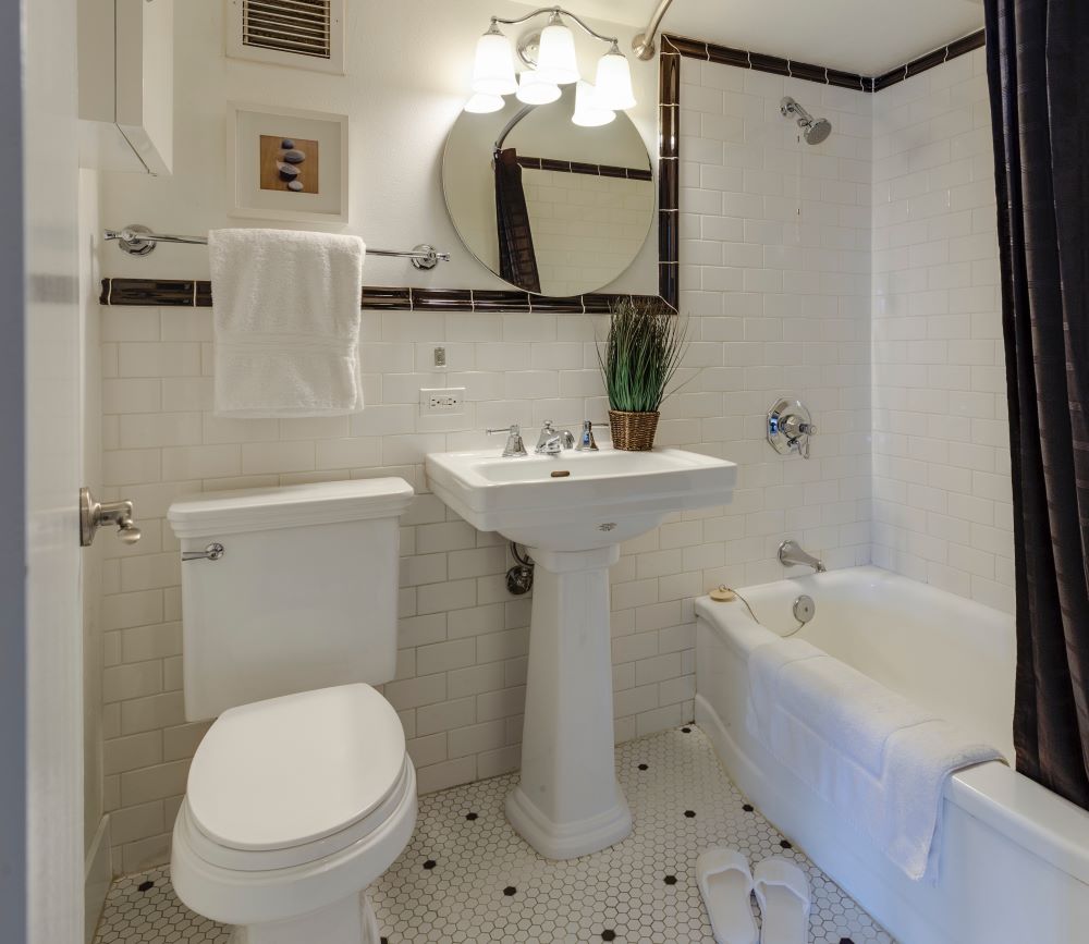white bathroom toilet seat bidet in tiny house